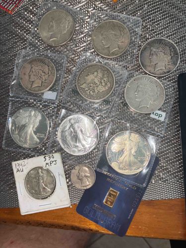 Assortment of U.S. Silver Dollars, Silver Eagles, a Gold Bar, and other Coins
