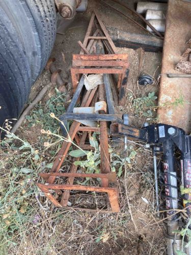 Assortment of Rusted Metal Frames and Scraps