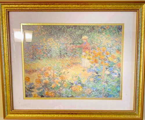Framed Print of Claude Monet's 'Woman with a Parasol in a Garden'