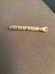 Carved Bone Implement with Hand Motif