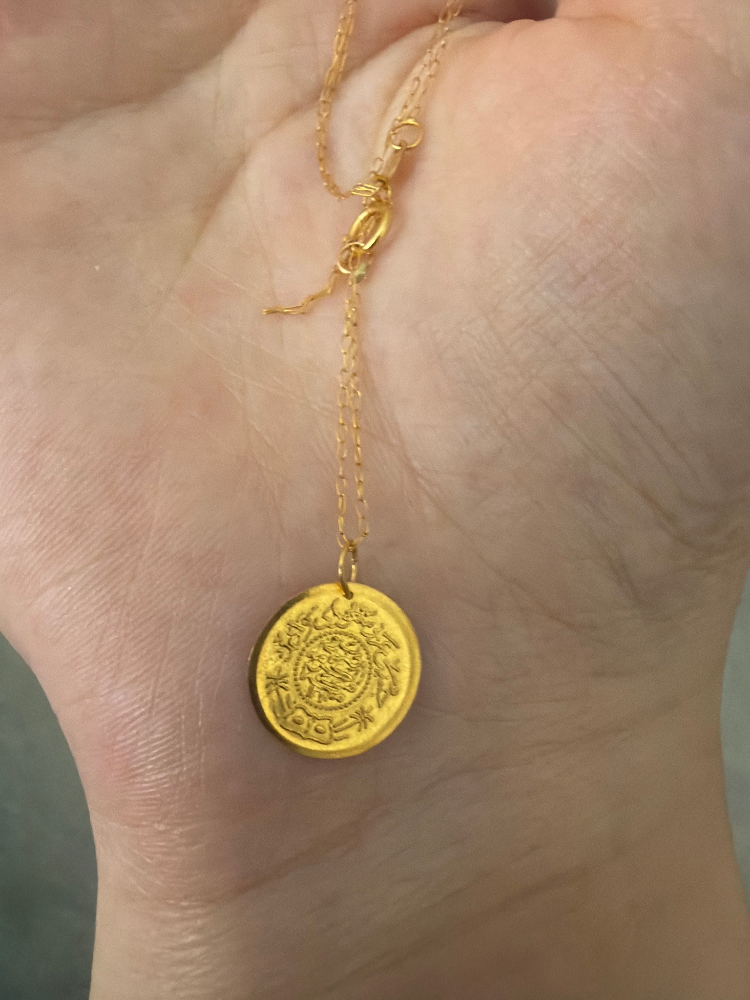 Submitted photo of Gold coin pendant necklace (unauthenticated)