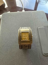 Gold-Tone Cuff Bangle Watch with Greek Key and Textured Details