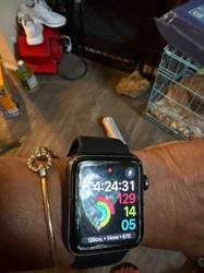 Apple Watch (Likely Series 2 or 3)