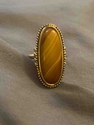 Oval Tiger's Eye Cabochon Ring with Beaded Bezel Setting