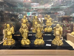 Set of Seven Faux-Ivory Asian Deity Figurines