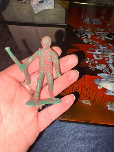 Vintage Army Man Toy Figure (Translucent Green with Red Paint Splashes)