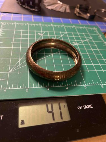 Hammered Metal Bangle with Gold-Toned Accent