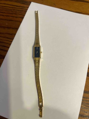 Seiko Ladies' Gold-Tone Quartz Bracelet Watch with Black Dial