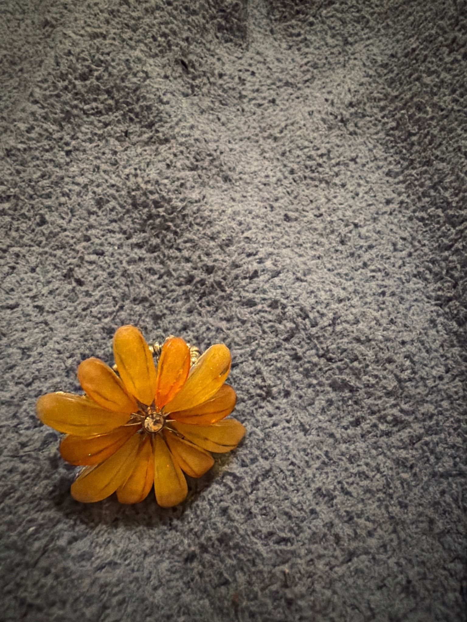 Submitted photo of Floral resin and rhinestone brooch