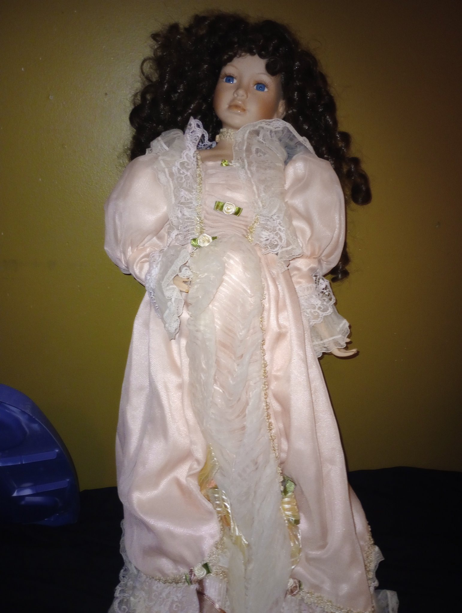Submitted photo of Porcelain collector doll in pink dress