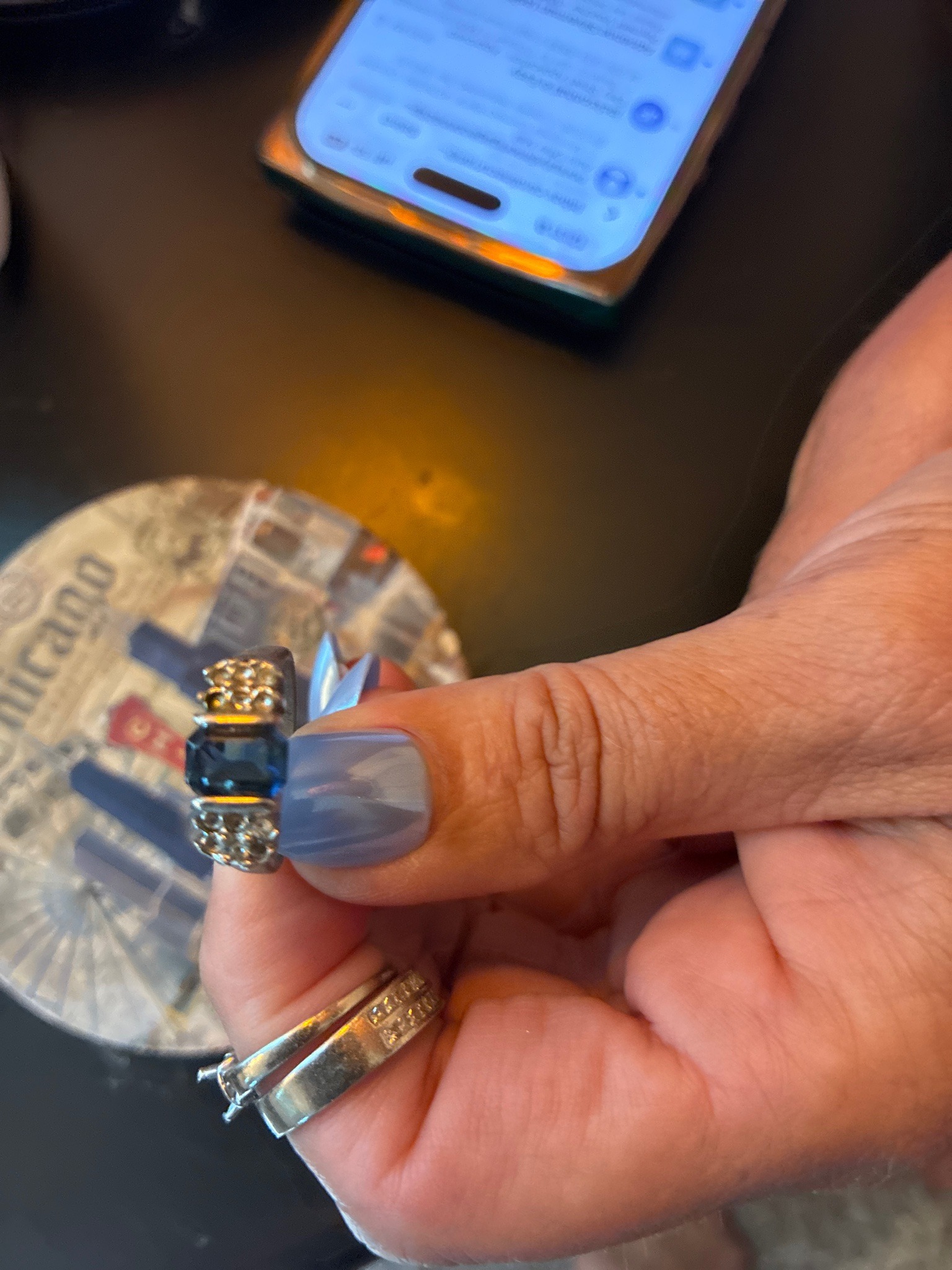 Submitted photo of Multi-stone gemstone ring with side diamonds
