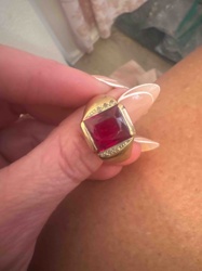 Gold-Toned Ring with Red Faceted Stone and Accent Stones