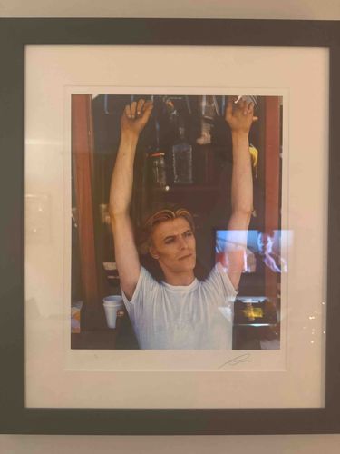 Framed Photograph of David Bowie with Arms Raised