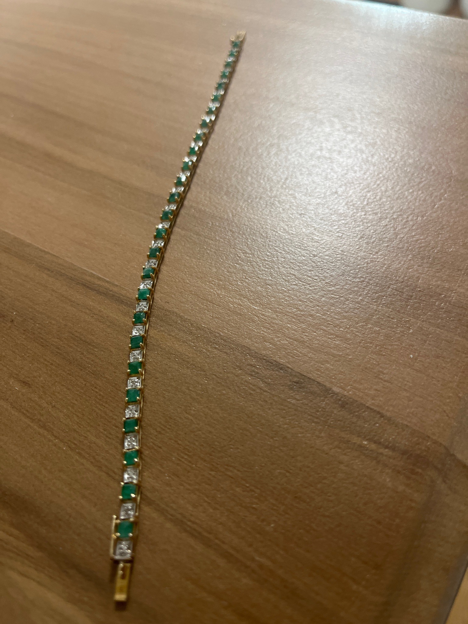Submitted photo of Gold and gemstone tennis bracelet