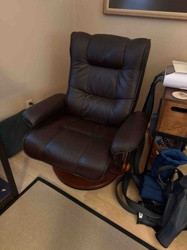 Brown Leather Swivel Recliner with Wooden Base