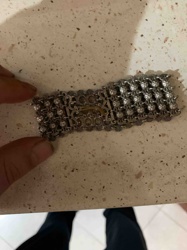 Silver-Toned Filigree Bracelet with Faux Diamonds and Central Medallion