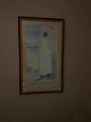 Framed Portrait of a Person in White Robe