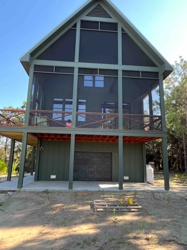 Modern Rustic Elevated House with Screened Porch and Garage