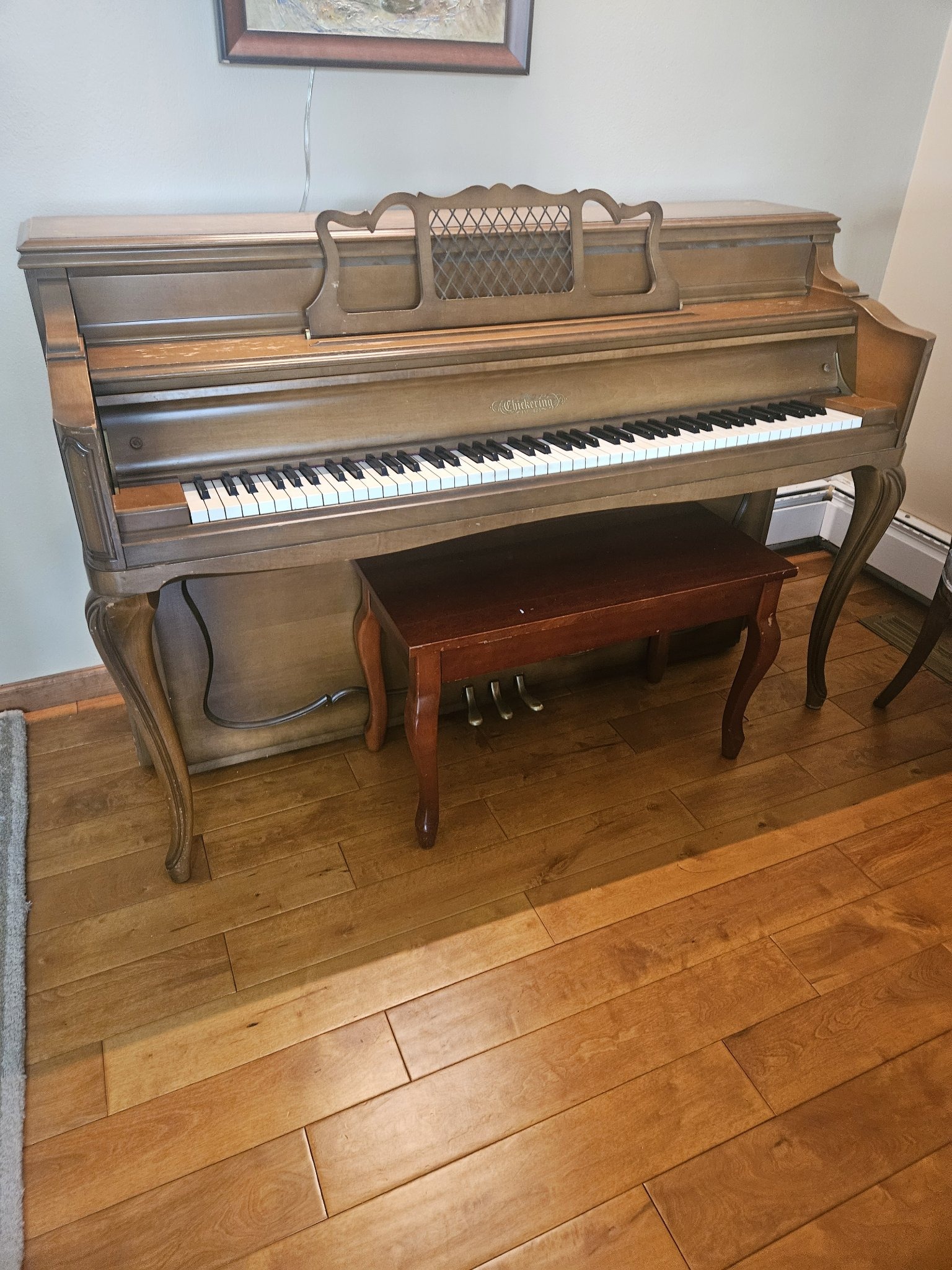 Submitted photo of Chickering console piano (not authenticated)