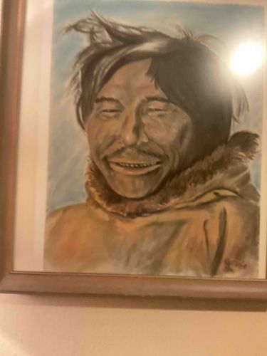 Portrait of an Inuit Man Smiling