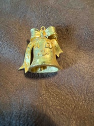 Gold-Toned Bell Pendant with Bow